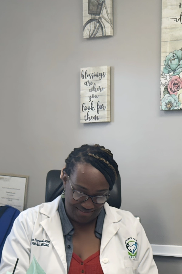 A male and a doctor smiling together