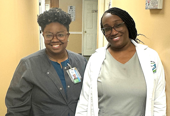 Two female doctor smiling